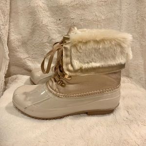 Rose gold duck boots with cream faux fur